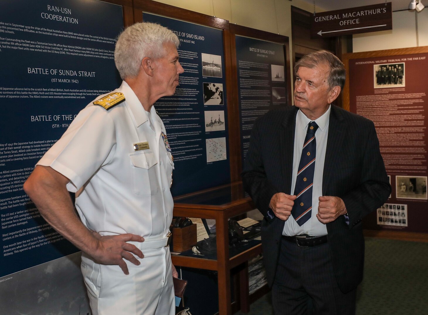 BRISBANE, Australia (March 15, 2023) – Mr. John Wright, managing director of the MacArthur Museum, gives Vice Adm. Karl Thomas, commander, U.S. 7th Fleet, a tour of the MacArthur Museum in Brisbane, Australia, after a ceremony commemorating the 80th anniversary of the formation of the U.S. 7th Fleet, March 15. 7th Fleet is the U.S. Navy's largest forward-deployed numbered fleet, and routinely interacts and operates with Allies and partners in preserving a free and open Indo-Pacific region. (U.S. Navy photo by Mass Communication Specialist 1st Class Deanna C. Gonzales)