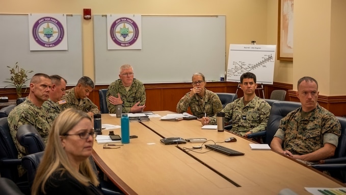 Navy Vice Adm. John Wade, Commander of Joint Task Force-Red Hill (JTF-RH) and senior leaders meet with Amy Miller, Director of the Enforcement and Compliance Assurance Division, Region 9 - U.S. Environmental Protection Agency, and Kathleen Ho, Deputy Director for Environmental Health of the Hawaii Department of Health, to provide a status update on the Red Hill Bulk Fuel Storage Facility (RHBFSF) defueling process at JTF-RH Headquarters on Ford Island, Hawaii, March 17, 2023. JTF-RH is in phase three of its five-phase defueling plan. Personnel are focused on completing repairs, quality control tasks, training, response preparation, the National Environmental Policy Act (NEPA) Environmental Assessment (EA), regulatory approvals and operational planning for such things as dewatering, repacking, and defueling. This extensive preparatory work will help ensure the safe and expeditious defueling of the RHBFSF. (U.S. Army photo by Spc. Matthew Mackintosh)