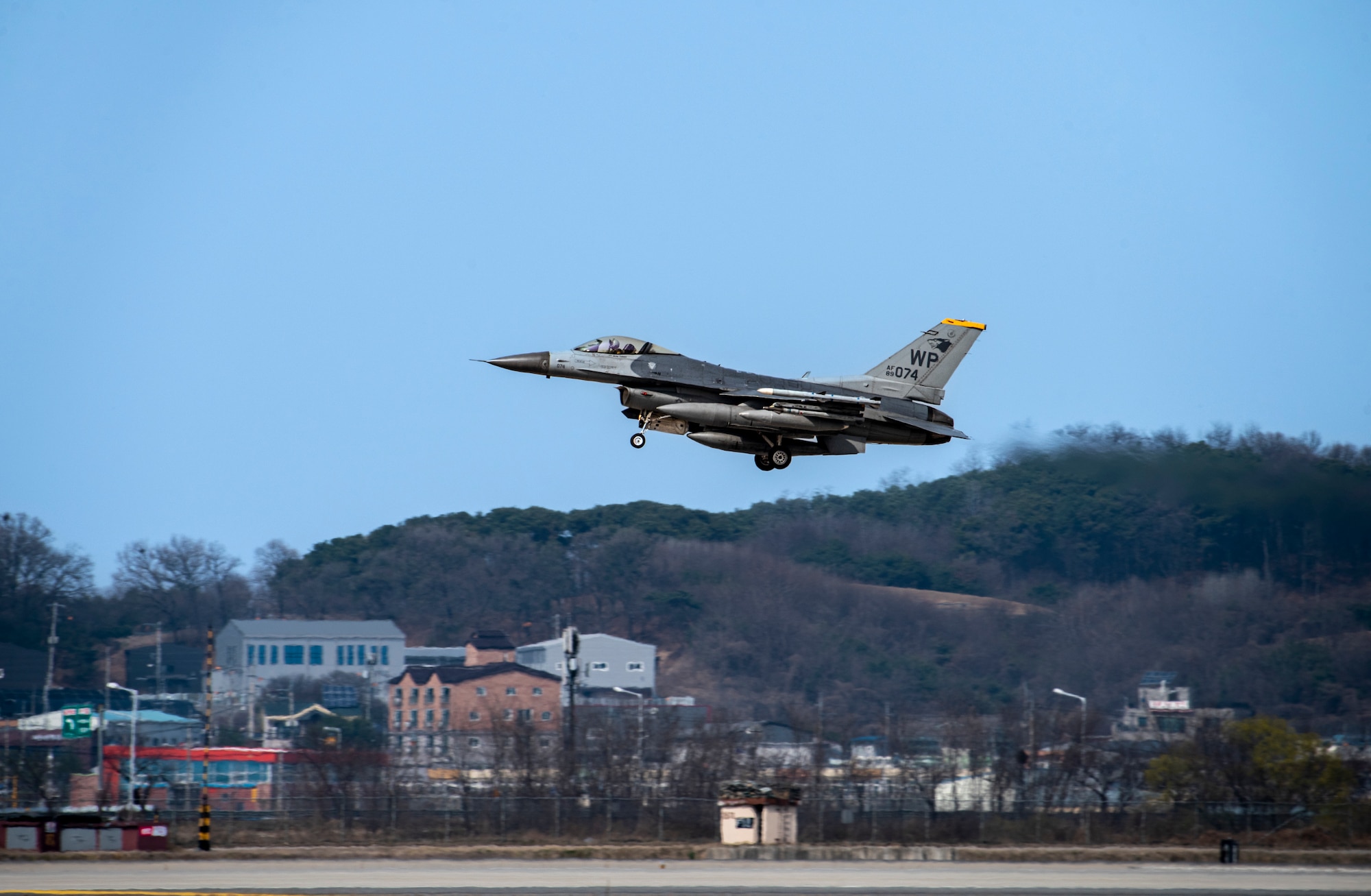 An F-16 Fighting Falcon assigned to the 80th Fighter Squadron, Kunsan Air Base, prepares to land at Osan AB, Republic of Korea, March 22, 2023.