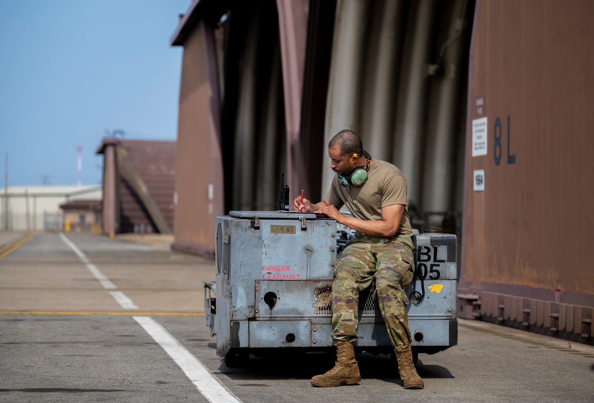 U.S. Air Force Tech Sgt. Jermaine Green, 80th Fighter Generation Squadron weapons expediter, Kunsan Air Base, documents maintenance in his work log at Osan AB, Republic of Korea, March 22, 2023.