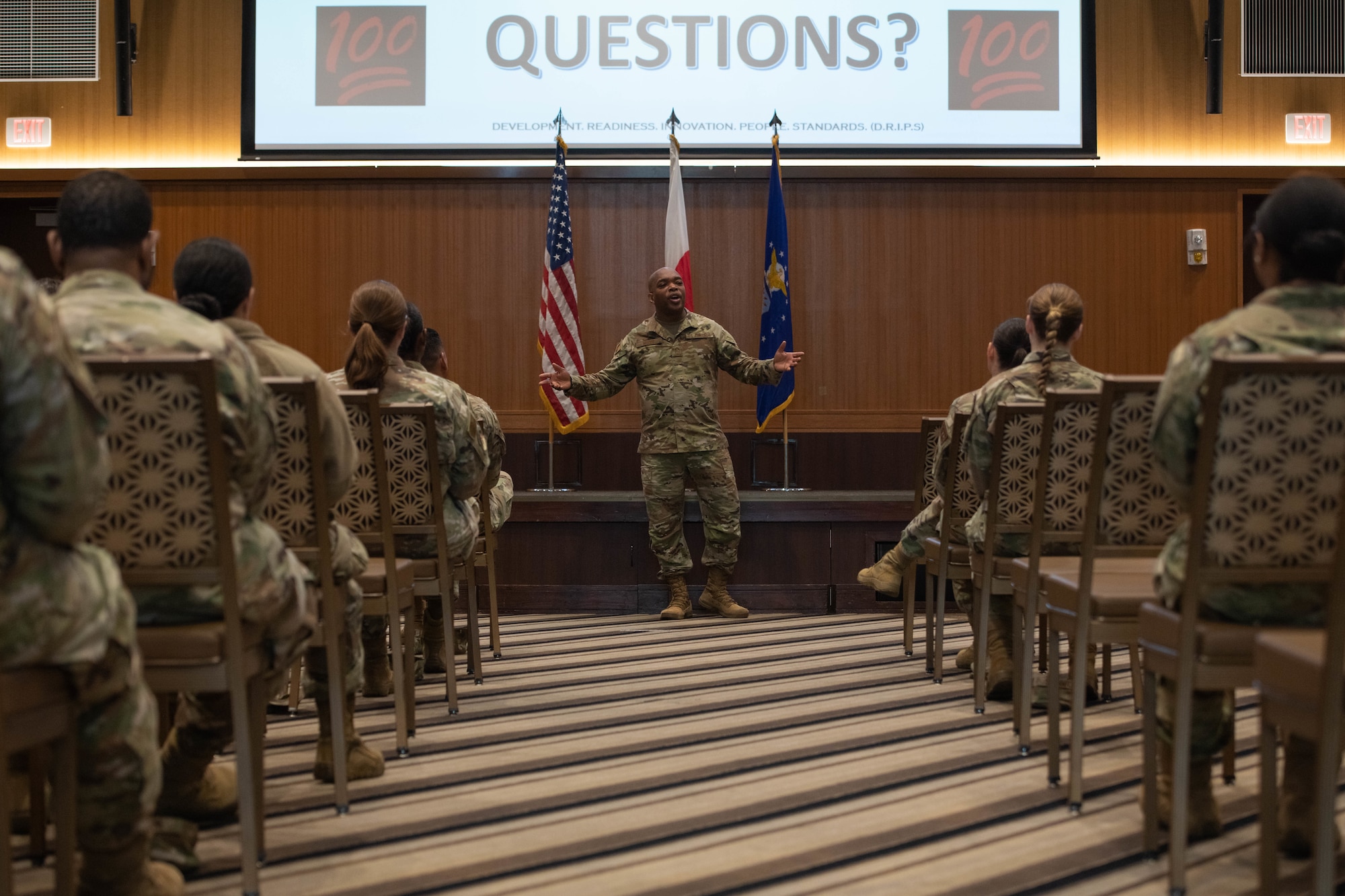 The Shogun Chief talks to an audience.
