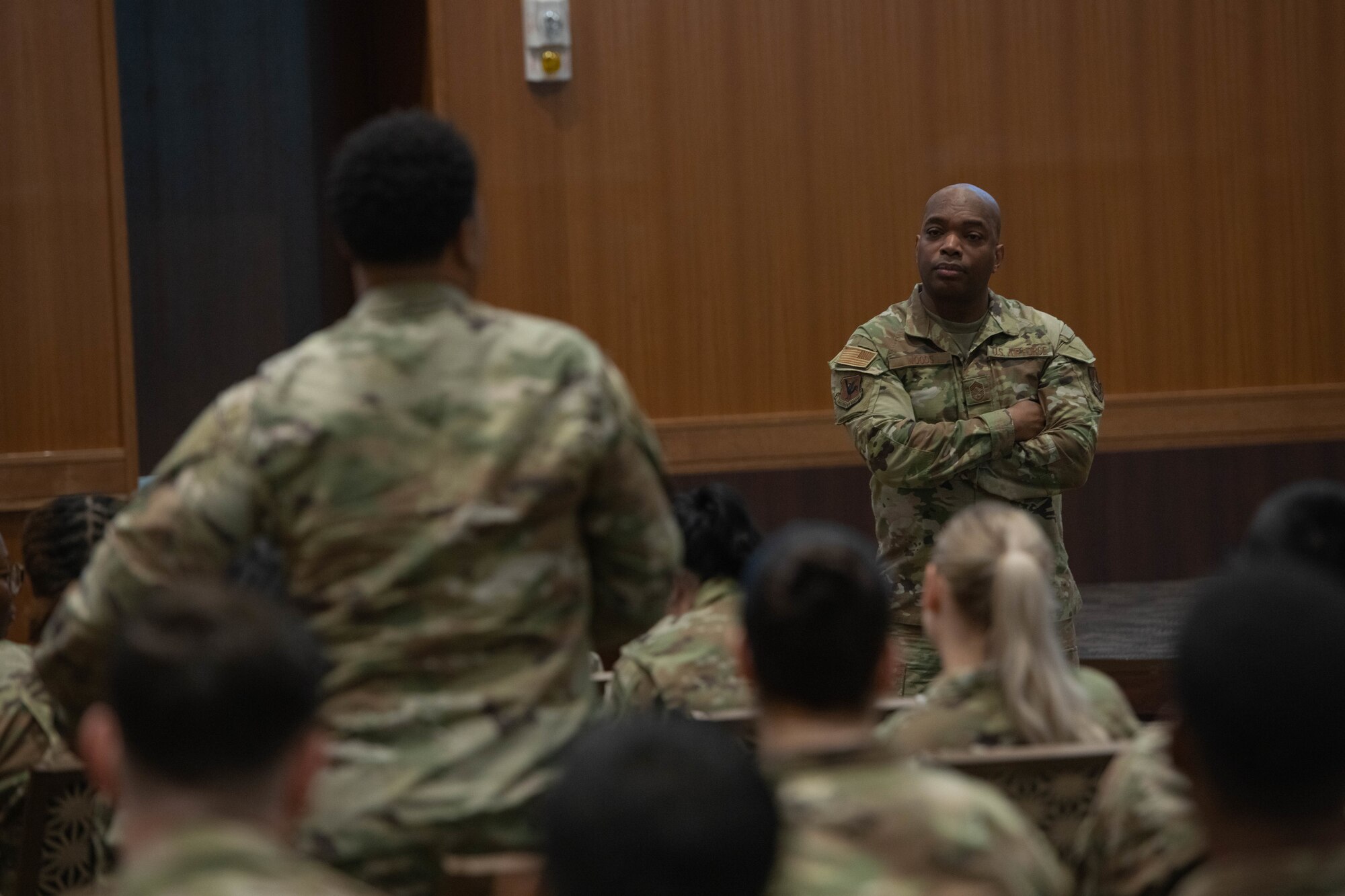 The Shogun Chief listens to an Airman's question.