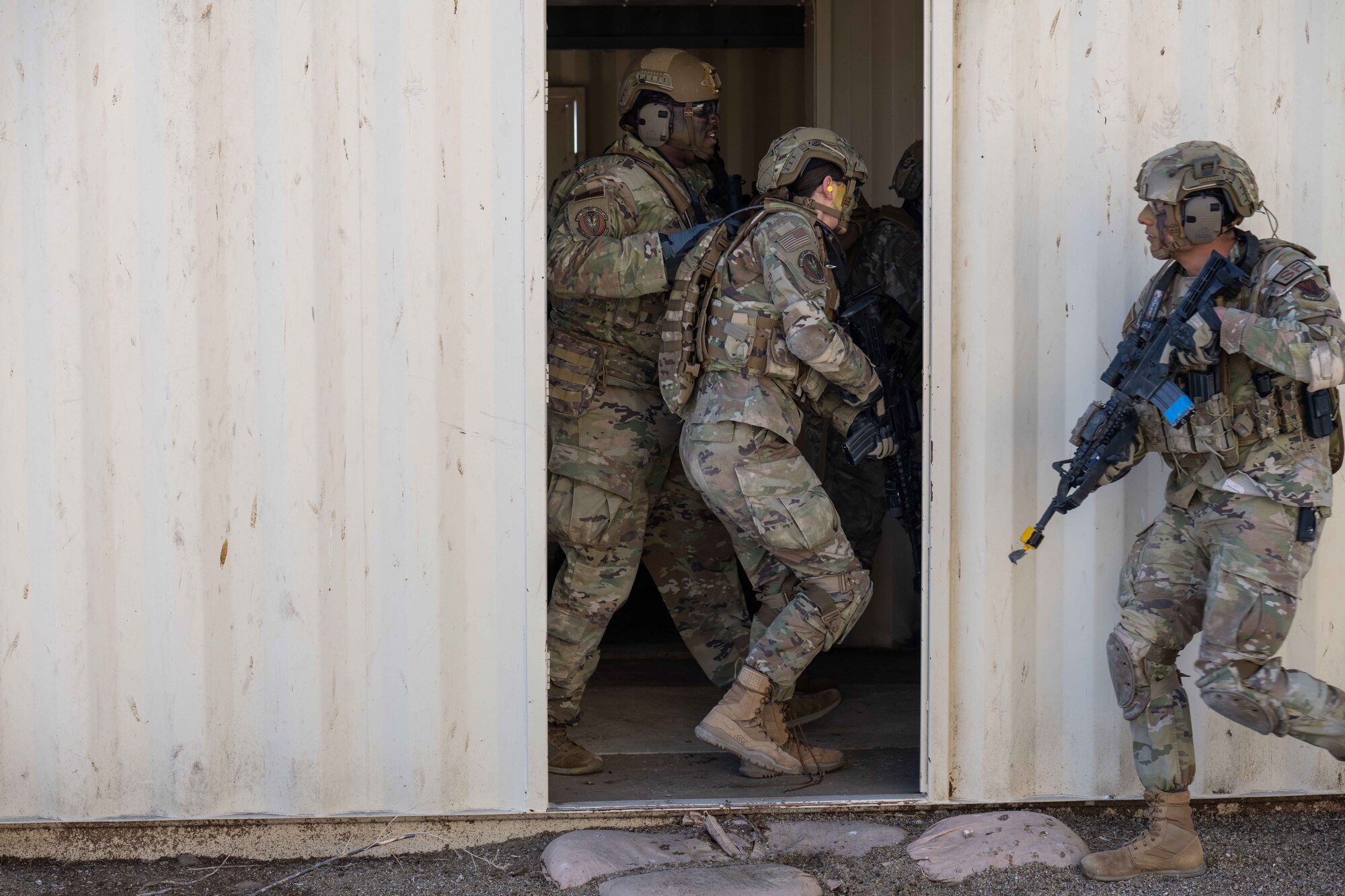 Photo if Airmen entering building