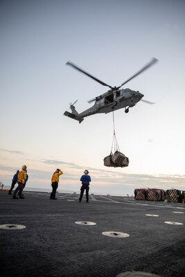 A helicopter delivers supplies.