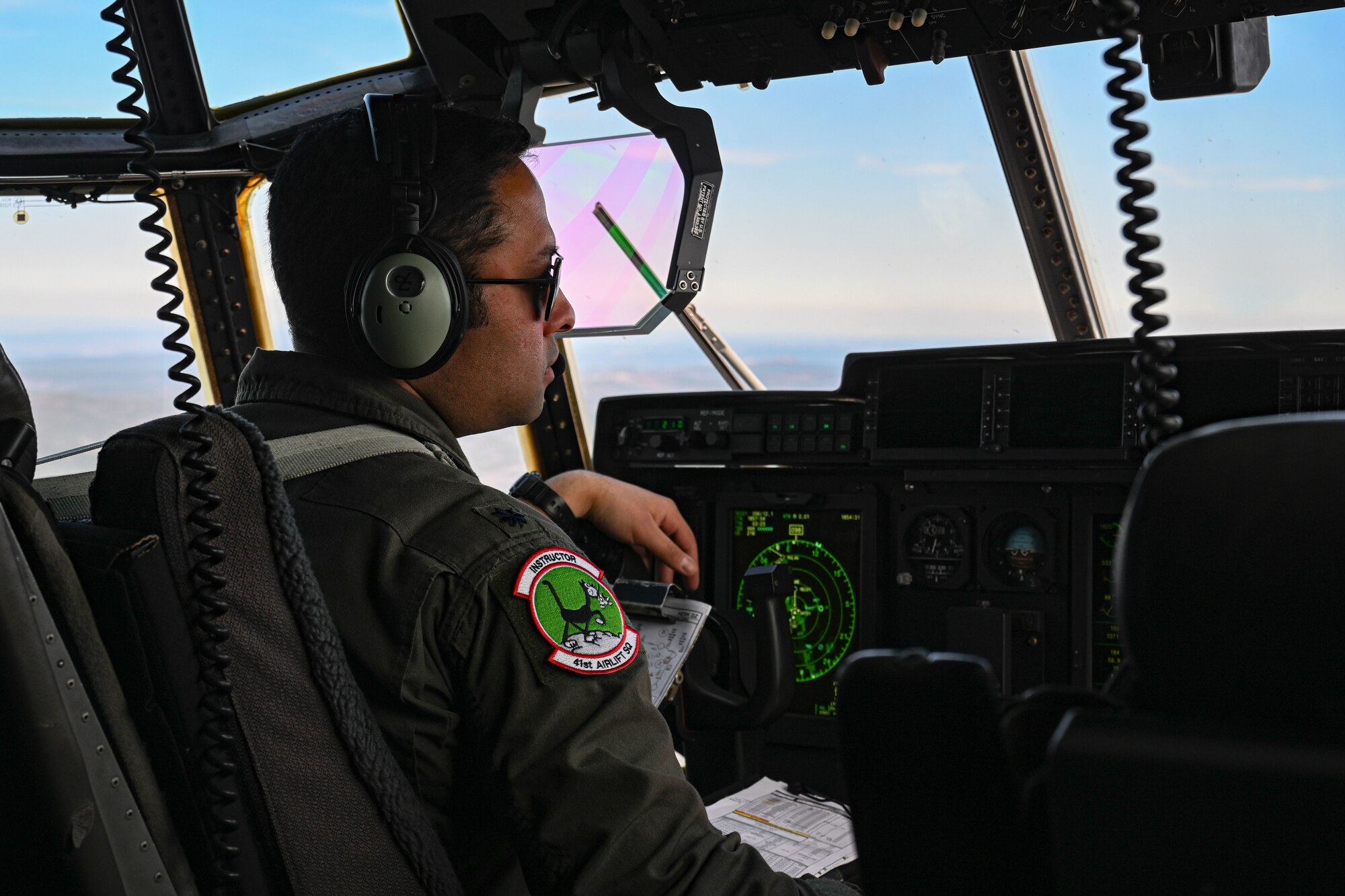 A C-130 flies over Arkansas