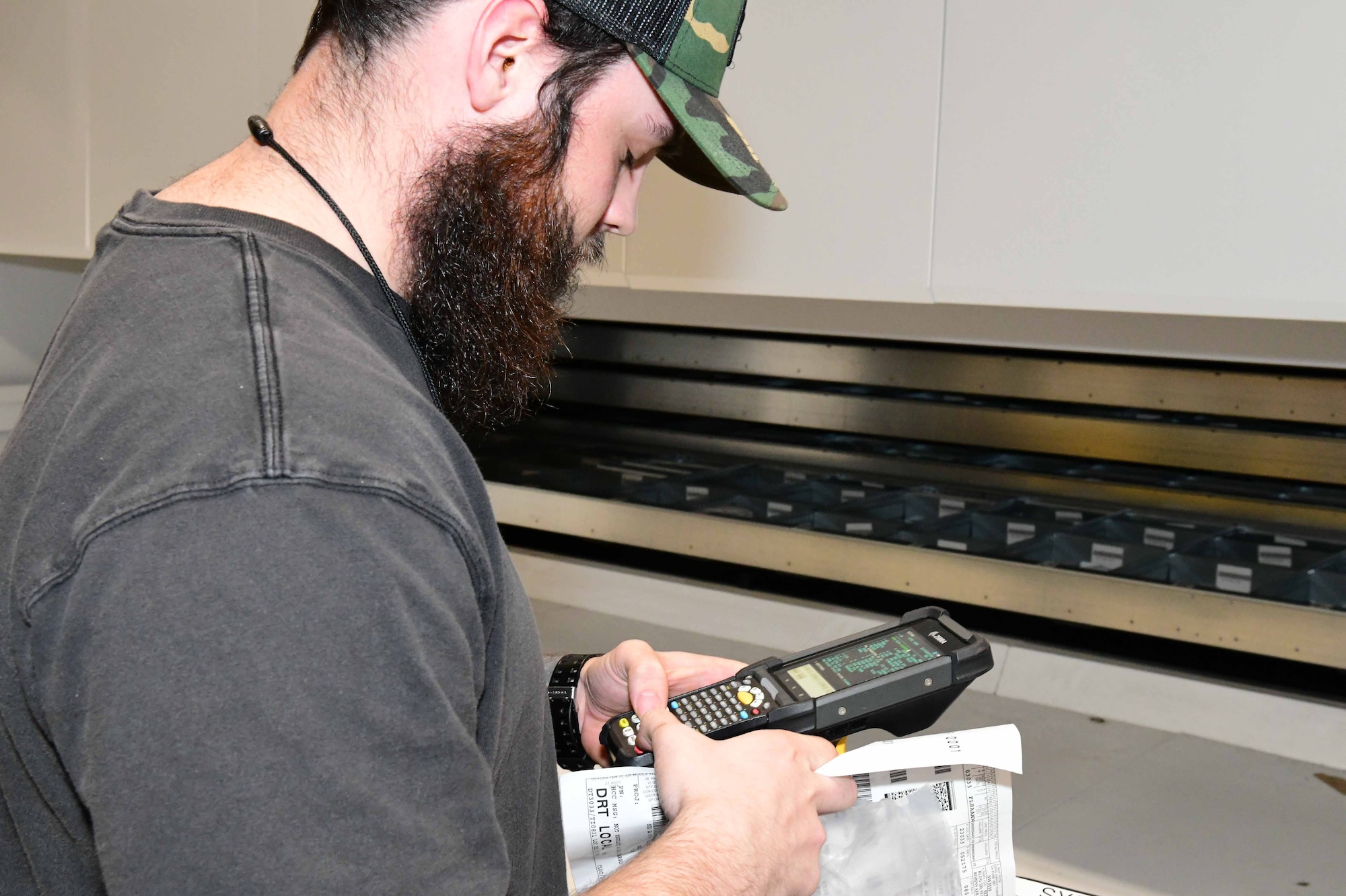 Man holds scanner