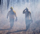 Ryan Bruce and Cody Rice, Quantico Fire & Emergency Services, conduct controlled burns at Marine Corps Base Quantico, Virginia, March 9, 2023. According to the NREA, the purpose of the burns is to reduce fuel litter, minimize the potential of wildfires, and promote wildlife habitat. Fuel litter is dead and trodden woody debris that could be used as fuel for wildfires or other potential hazards.
