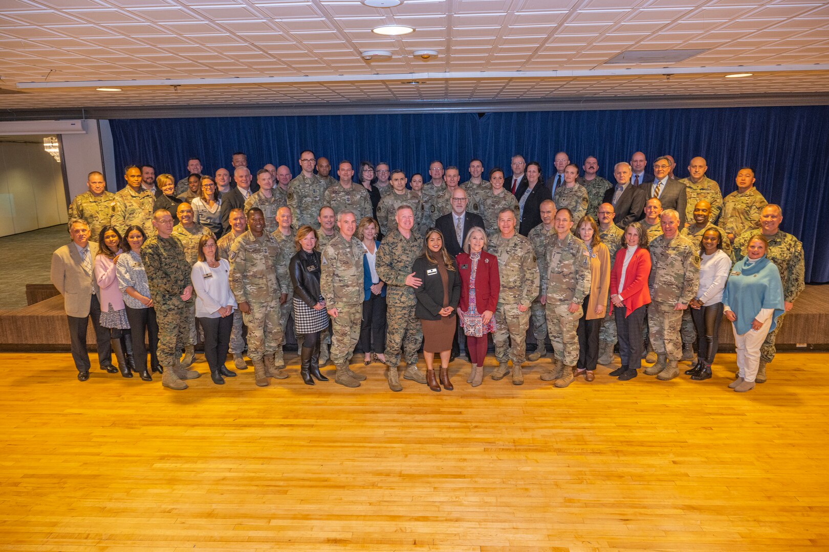 U.S. Army Gen. James Dickinson, U.S. Space Command Commander, U.S. Marine Corps Master Gunnery Sgt. Scott Stalker, USSPACECOM command senior enlisted leader and U.S. Space Force Lt. Gen. John Shaw, USSPACECOM deputy commander pose for a photo with attendees of the 2023 Spring Commander’s Conference, March 16, 2023, at Peterson Space Force Base, Colo. The mission of semi-annual Commander’s Conference is to have full understanding of the Command’s Campaign Plan priorities, implementation successes, risks, key gaps and to identify option to mitigate gaps to achieve the Commander’s vision.  (USSPACECOM photo by Mass Communication Specialist 1st Class John Philip Wagner, Jr)