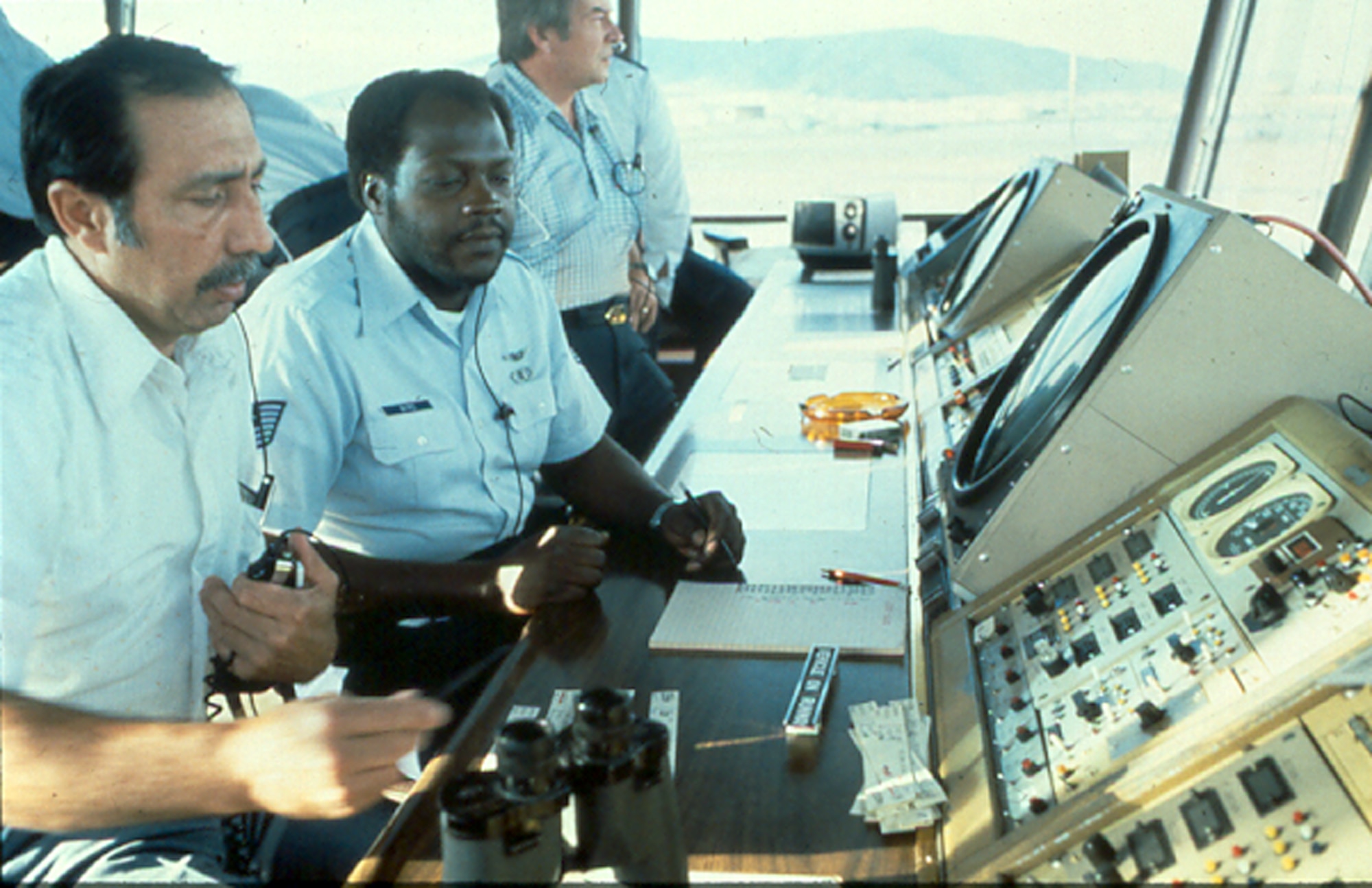 Men work in the San Francisco Control Tower.