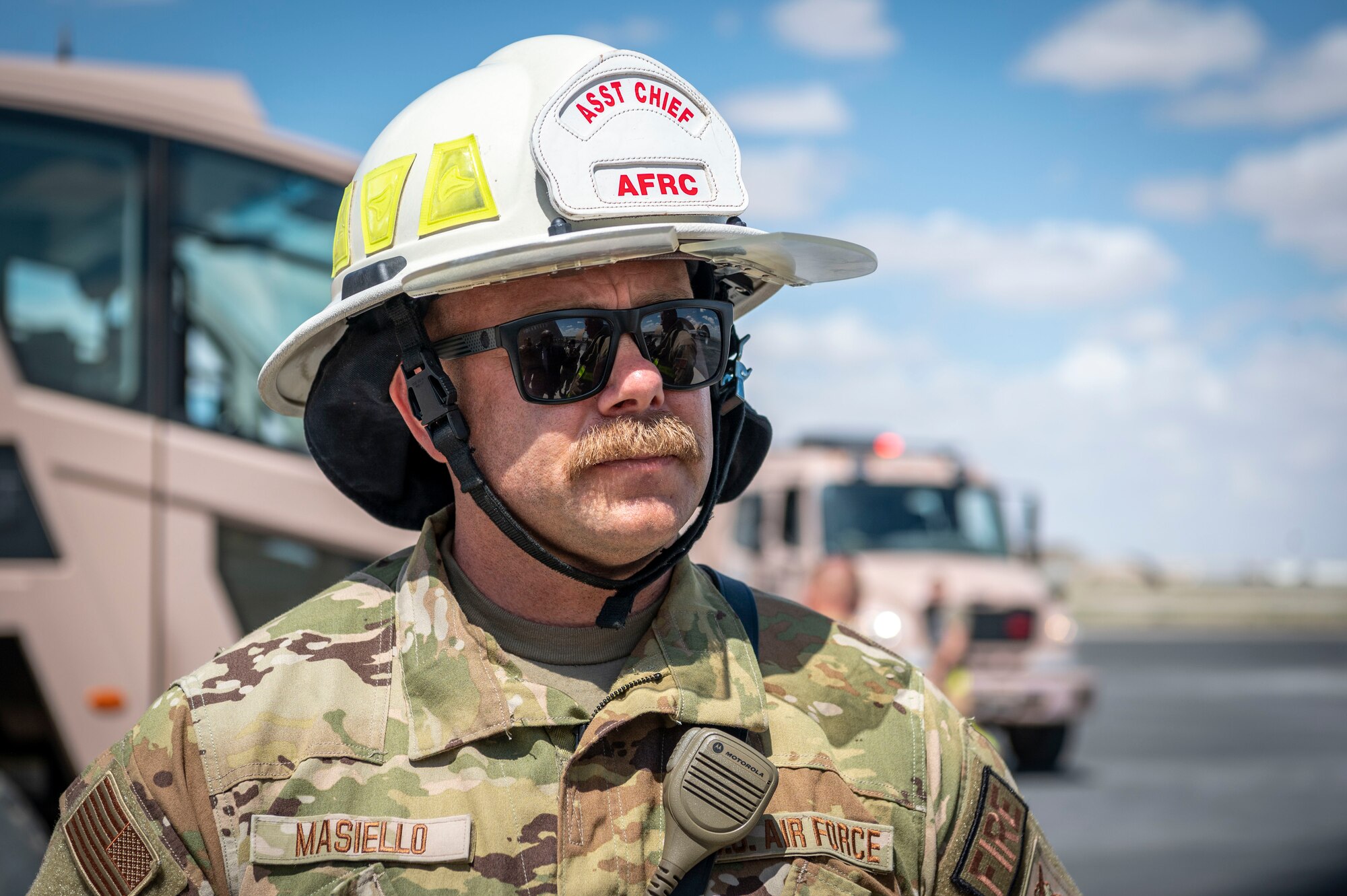 U.S. Air Force Master Sgt. Joseph Masiello, the 386th Expeditionary Civil Engineer Squadron assistant chief of operations, stands by for Kuwaiti newspaper journalist questions during Media Day at Ali Al Salem Air Base, Kuwait, March 21, 2023.