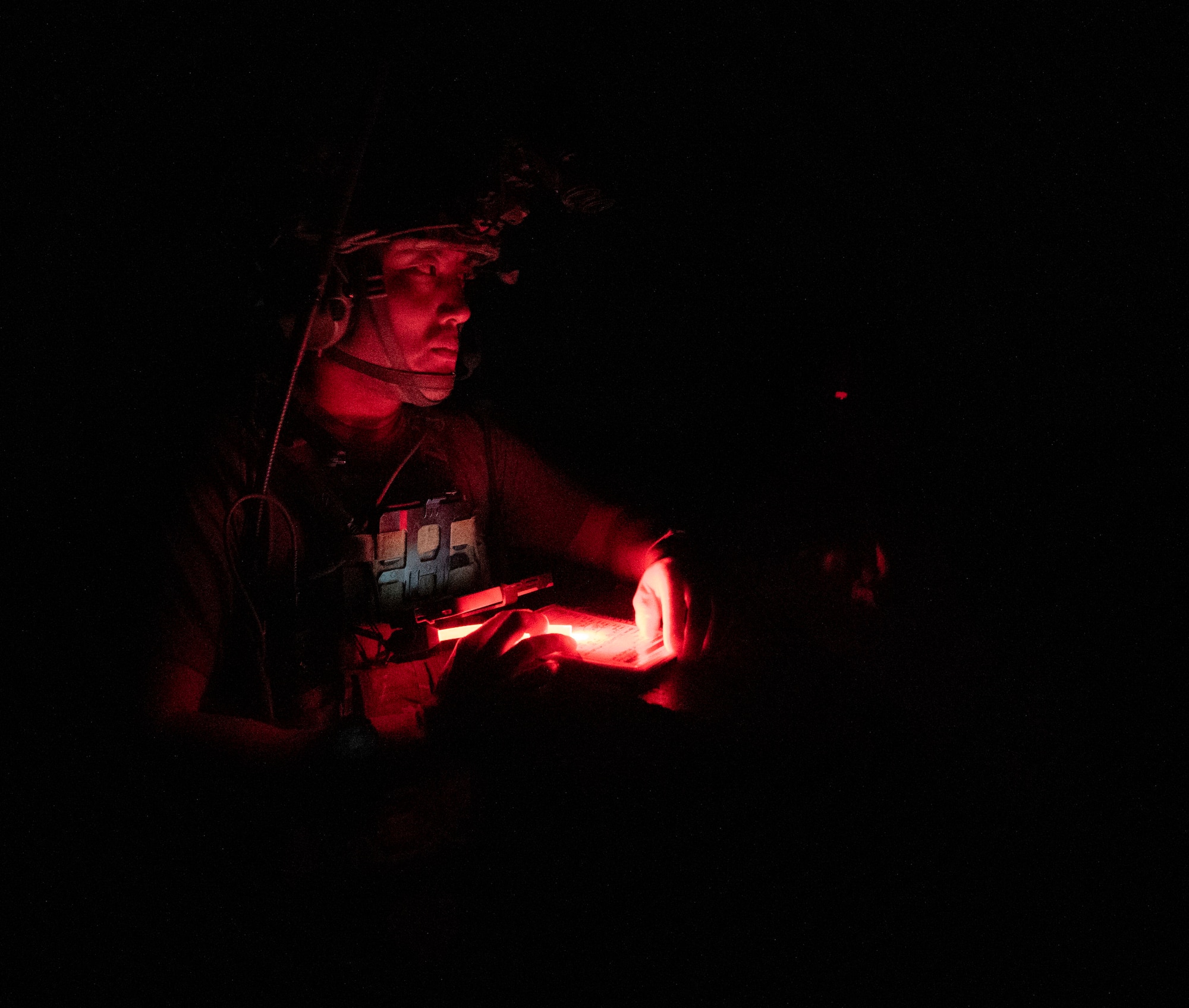 U.S. Air Force 82nd Expeditionary Air Support Operations Squadron tactical air control party Airman, estimates the range of the target during training at Udairi Range, Kuwait, March 14, 2023.