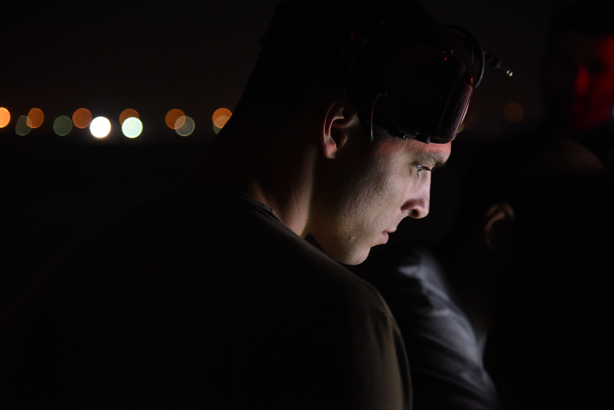 U.S. Air Force Staff Sgt. Gage Robinson, Multi-Capable Airman Team 1 member, looks over a pre-flight checklist during the Operation Agile Spartan 4 exercise at Al Dhafra Air Base, United Arab Emirates, March 10, 2023. Multi-Capable Airman training reduces the number of people who must be put in harm’s way to generate airpower relative to traditional manning models. (U.S. Air Force photo by Tech. Sgt. Chris Jacobs/released)