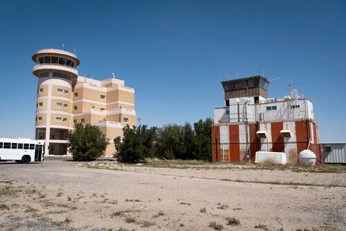 A comparison between the old air traffic control tower and new ATC tower is shown during Media Day at Ali Al Salem Air Base, Kuwait, March 21, 2023.