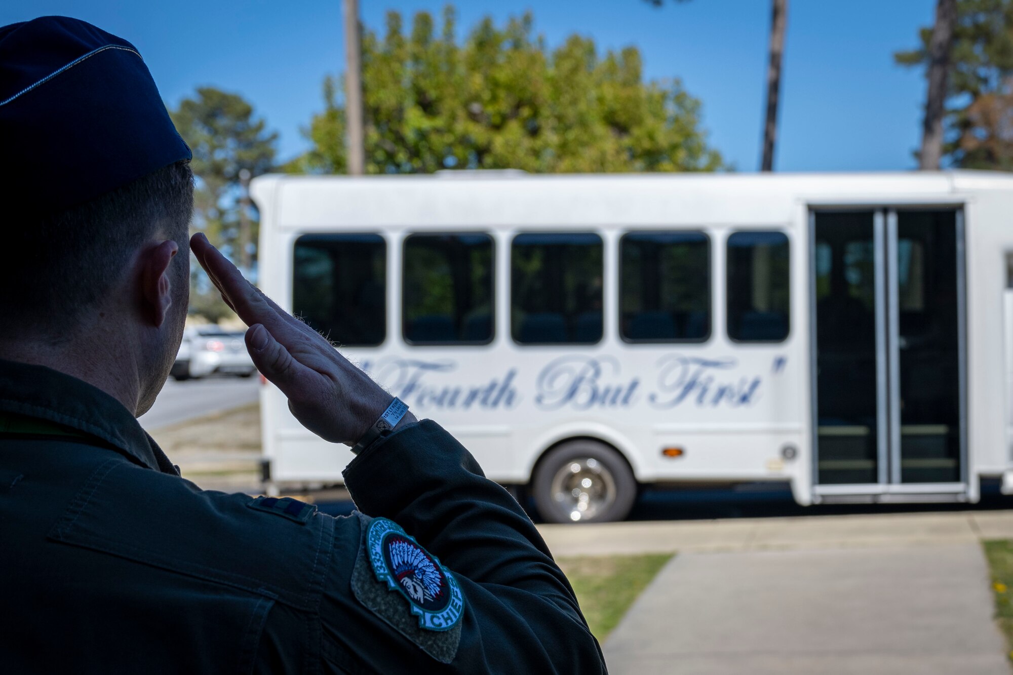 Capt. Morgan Curriden, 335th Fighter Squadron pilot, salutes the 4th Fighter Wing surrey bus at Seymour Johnson Air Force Base, North Carolina, March 15, 2023. Aboard the surrey was Col. Lucas Teel, 4th Fighter Wing commander, and the Honorable Wiley Nickel, North Carolina congressman.