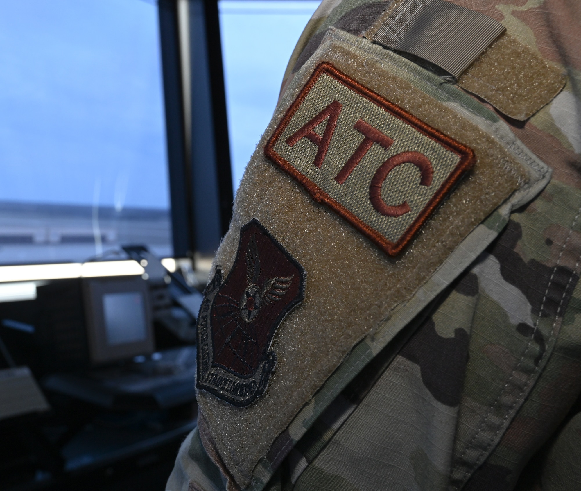 The Air Traffic Control tower is responsible for disseminating information for emergency response situations at Whiteman Air Force Base, Mo., March 15, 2023. The tower controller’s have a primary crash alarm system at their workstation which they use to alert emergency responders of the situation. (U.S. Air Force photo by Airman 1st Class Hailey Farrell)