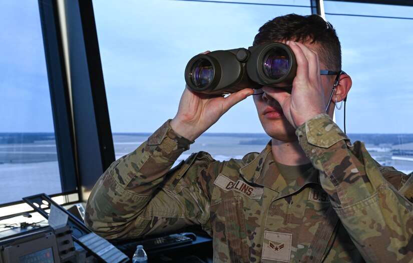 U.S. Air Force Airman 1st Class Dylan Collins, 509th Operations Support Squadron, Air Traffic Control apprentice watches the air space at Whiteman Air Force Base, Mo., March 15, 2023. The airspace the ATC tower is responsible for is about 7.5 miles out and up to 2,500 feet. (U.S. Air Force photo by Airman 1st Class Hailey Farrell)