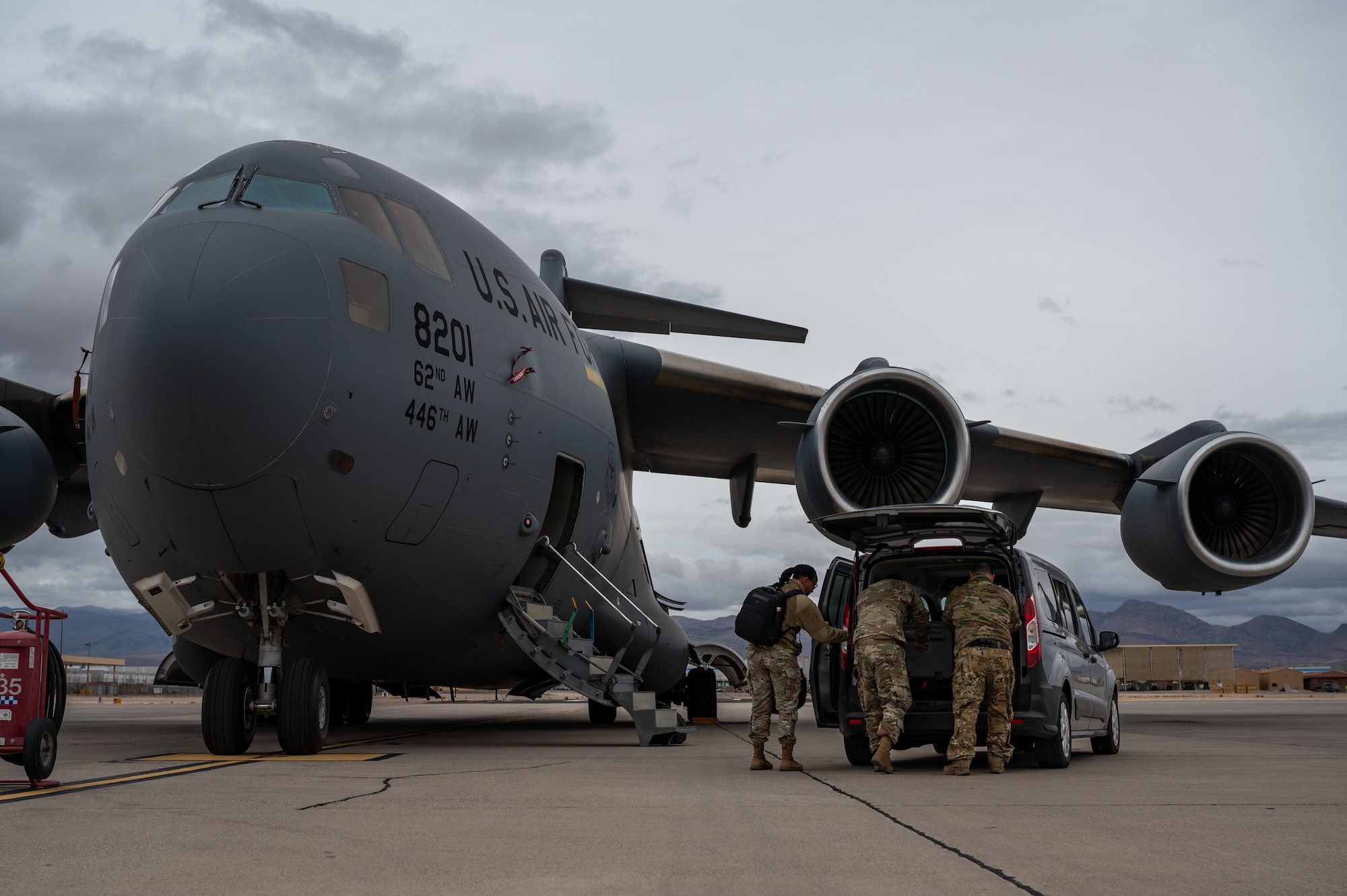 United States Air Force and Army service members disassemble the Command and Control Element after Black Flag 23-1 operations at Nellis Air Force Base, Nevada, Feb. 23, 2023. This allowed for Air Force Command and Control to access real time data and resources to execute live operations. (U.S. Air Force photo by Airman 1st Class Josey Blades)