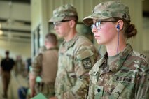 Soldiers in U.S. Army uniform await for instructions during Pistol Match