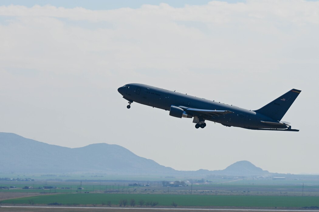 A KC-46 Pegasus takes off from the Altus Air Force Base (AFB), Oklahoma, flightline, March 24, 2022, during a large force exercise. Aviators from the 56th Air Refueling Squadron primarily operate the KC-46 at Altus AFB, which stood up August 1, 2016, as the first formal training unit for the U.S. Air Force’s newest air refueling and cargo aircraft. (U.S. Air Force photo by Senior Airman Trenton Jancze)