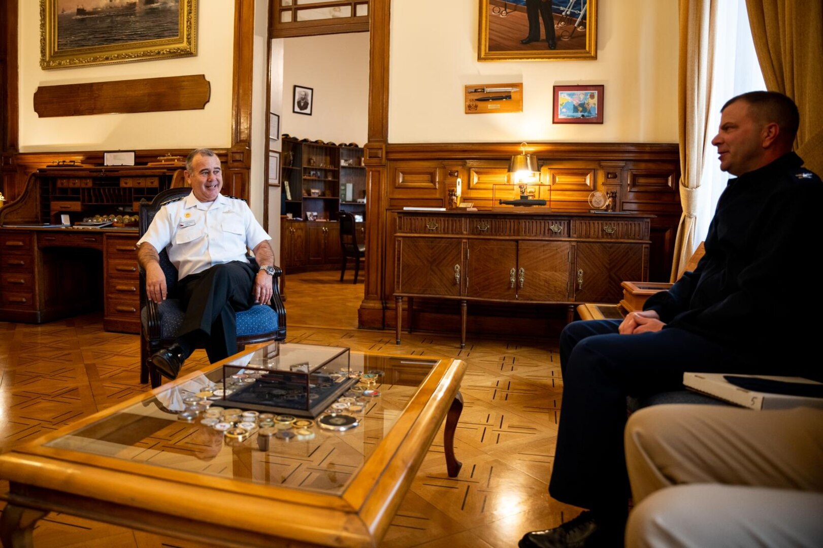 Chilean Navy Rear Adm. Juan Zúñiga, Commander of the First Naval Zone, and U.S. Coast Guard Capt. Keith Ropella, Commanding Officer of Coast Guard Cutter POLAR STAR (WAGB 10) converse in the Headquarters of the First Naval Zone, Valparaíso, Chile, March 20, 2023. Chile and U.S. have a deep and enduring military and scientific collaboration, particularly as Chile and U.S. celebrate 200 years of diplomatic relations. (U.S. Coast Guard photo by Petty Officer 3rd Class Aidan Cooney)