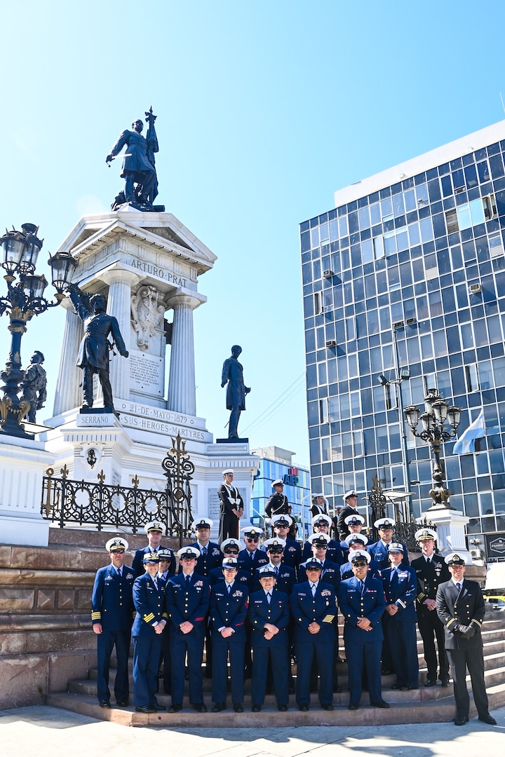 U.S. Coast Guard Cutter Polar Star crew render honors to the Heroes of the Battle of Iquique at the changing of the guard ceremony in historic Plaza Sotomayor, Valparaiso, Chile, March 22, 2023. The monument is also the crypt for Capt. Arturo Prat and other fallen heroes of the 1879 battle, and the Polar Star crew paid their respects at the tombs after the ceremony. Chief Engineer Eduardo Hyatt from the Chilean frigate Esmeralda was an American citizen who died bravely alongside his Chilean shipmates in the battle. (U.S. Coast Guard photo by Senior Chief Petty Officer Charly Tautfest)