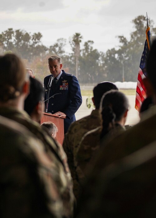 A man gives a speech to a crowd.