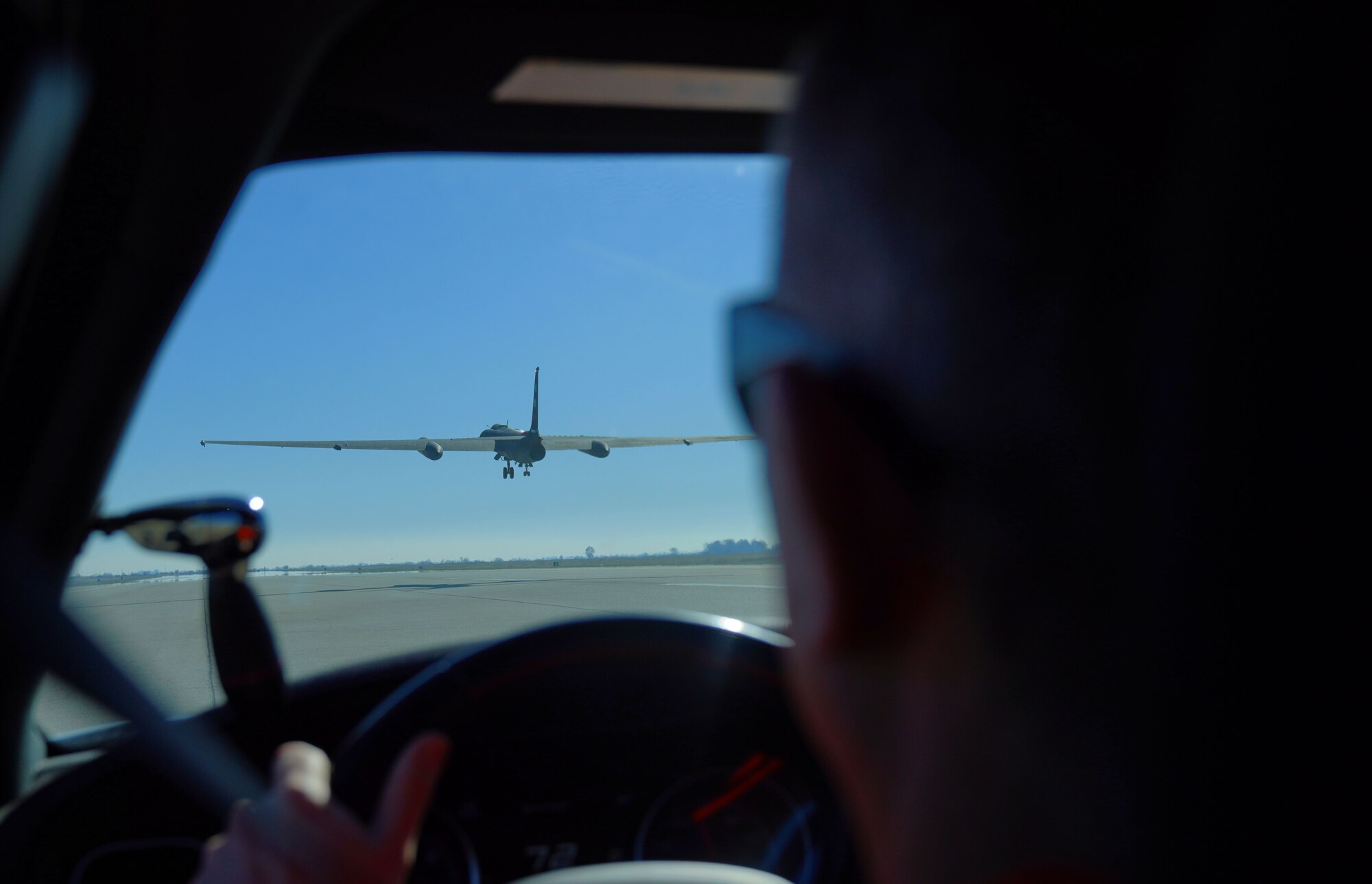 U.S. Air Force civilian Joshua Smith, 1st Reconnaissance Squadron U-2 instructor pilot, drives a chase car on the flightline Jan. 25, 2023, at Beale Air Force Base, Calif.