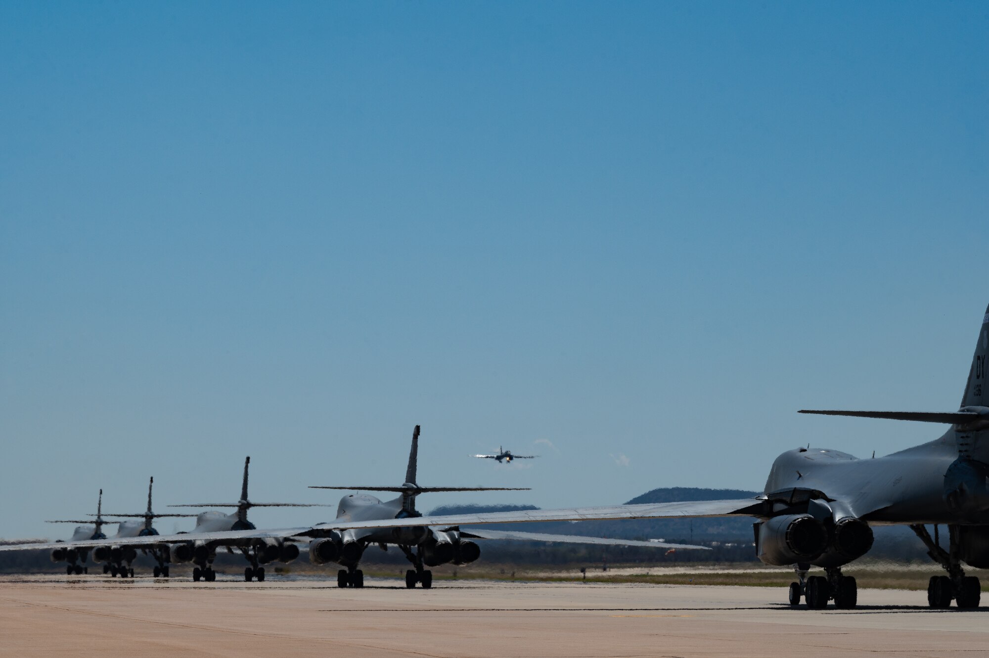 A B-1B Lancer lands on the flightline at Dyess Air Force Base, Texas, March 24, 2023. Seven B-1s returned to Dyess after being relocated to Holloman AFB, New Mexico, due to possible major storms. The short-notice aircraft relocation demonstrated the agility of 7th Bomb Wing Airmen while confirming Dyess Strikers are ready to implement agile combat employment on a moment's notice. (U.S. Air Force photo by Airman Emma Anderson)