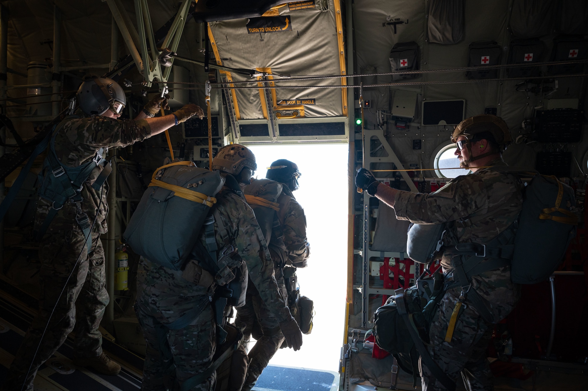 Survival, Evasion, Resistance and Escape specialists from Nellis and Edwards Air Force Base execute a static line jump during Red Flag-Nellis 23-2 at Nellis Air Force Base, Nevada, March 16, 2023.