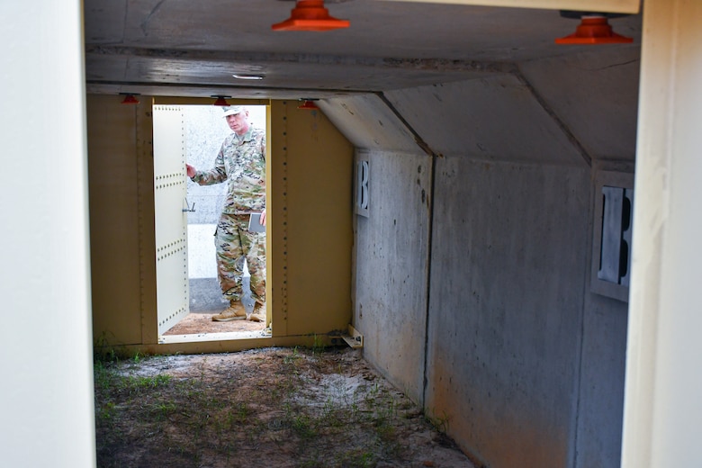 Col. William C. Hannan, Jr., U.S. Army Corps of Engineers Transatlantic Division commander, examines innovative design feature updates on the U.S. Army Central’s Bunker Retrofit project, designed to increase protection for servicemembers throughout the U.S. Central Command’s area of operations, prior to the U.S. Army Engineer Research and Development Center’s Phase II Live-fire Experiment at Fort Polk, La., Mar. 10.