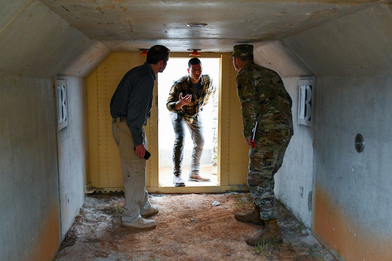 Brian J. Blusius, U.S. Army Corps of Engineers Transatlantic Middle East District structural engineer (center), explains innovative design feature updates on the U.S. Army Central’s Bunker Retrofit project, designed to increase protection for servicemembers throughout the U.S. Central Command’s area of operations, prior to the U.S. Army Engineer Research and Development Center’s Phase II Live-fire Experiment at Fort Polk, La., Mar. 10.