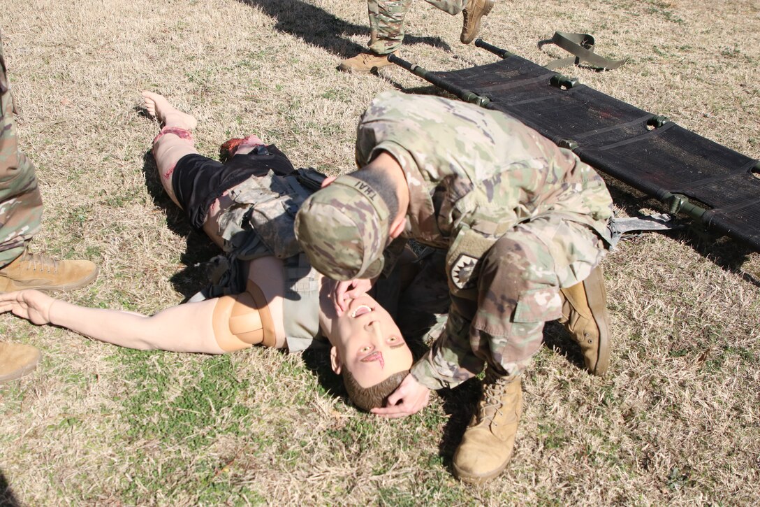 Spc. Thai, uses the TC3X Mannequin to simulate clearing an injured Soldiers airway.
Combat Medic Specialists (68W) from various Reserve and National Guard units reported to the Tass Training Center (TTC) Lee for the 80th Training Command’s 94th Training Division’s 68W recertification training.