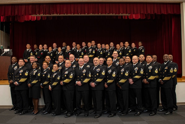 The 2022 Regional Naval Medical Forces Atlantic (NMFL) Sailor of the Year (SOY) recipient Hospital Corpsman 1st Class Travis Hunter, assigned to Navy Medicine Readiness and Training Command (NMRTC) Rota, takes a group photo with SOY finalists, senior enlisted leaders, and command master chiefs during a ceremony onboard Naval Support Activity (NSA) Portsmouth-Annex, March 24, 2023.