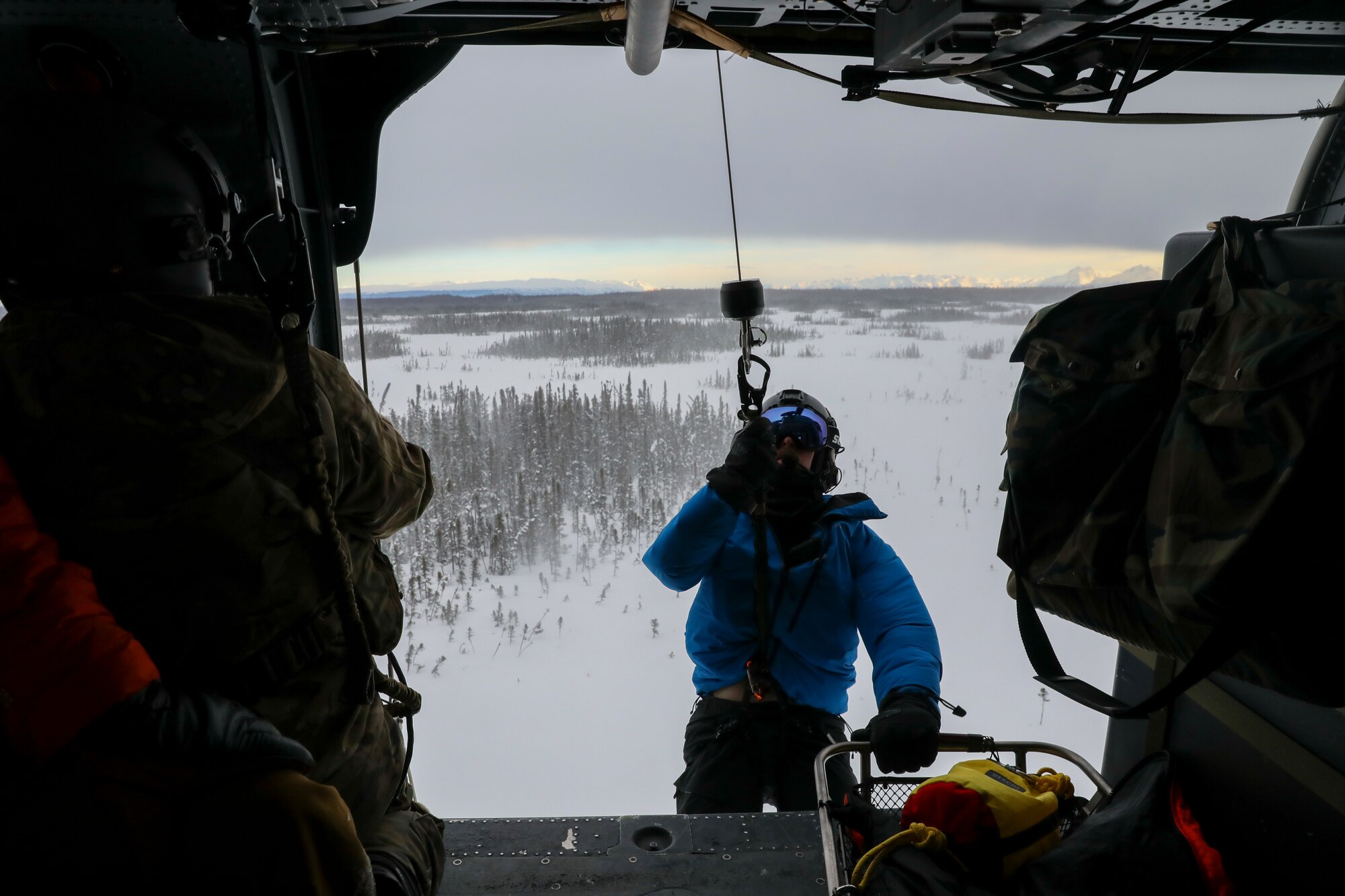 176th Wing rescues snowmachiners stranded in ravine