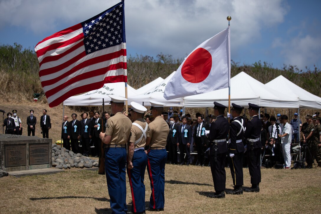 U.S. Marines and Japan Self Defense Force service members serve as the color guard during the 78th Reunion of Honor ceremony, Iwo To, Japan, March 25th, 2023. The Reunion of Honor ceremony is held annually to bring together leaders from the U.S. and Japan, veterans, distinguished guests, and their family members to pay tribute to service members lost during the Battle of Iwo Jima, and is a testament to the ironclad U.S.-Japan alliance which has blossomed over the past 78 years. (U.S. Marine Corps photo by Lance Cpl. Sebastian Riveraaponte)