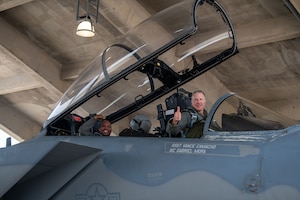 Airmen pose for a photo.