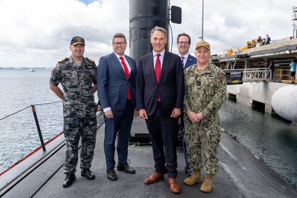 HMAS STIRLING, Australia (March 16, 2023) - Australian Deputy Prime Minister Richard Marles, center, poses for a photo onboard the Los Angeles-class fast-attack submarine USS Asheville (SSN 758) with Royal Australian Navy Vice Adm. Jonathan Mead, Chief Nuclear Powered Submarine Task Force, Minister for Defence Industry Pat Conroy, Minister for Defence Personnel and Veterans' Affairs Matt Keogh, and Rear Adm. Rick Seif, commander, Submarine Group 7 following a tour, March 16. Asheville conducted multiple tours for distinguished visitors during a routine port visit to HMAS Stirling, Western Australia to enhance interoperability and communication, and strengthen relationships with the Royal Australian Navy. (Courtesy photo by Australian Department of Defence)