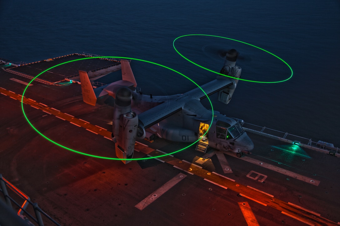 An MV-22B Osprey assigned to Marine Medium Tiltrotor Squadron (VMM) 266, 26th Marine Expeditionary Unit, prepares to takeoff during flight operations aboard the USS Kearsarge (LHD 3), while sailing off the coast of Onslow Beach, N.C., Jan. 29, 2013. The 26th MEU is conducting Composite Training Unit Exercise, the final phase of a six-month pre-deployment training program. The 26th MEU operates continuously across the globe, providing the president and unified combatant commanders with a forward-deployed, sea-based quick reaction force. The MEU is a Marine Air-Ground Task Force capable of conducting amphibious operations, crisis response and limited contingency operations.
