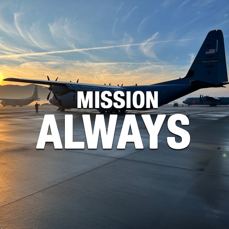 A white graphic text displaying the words Mission Always in front of a photograph of C-130J military aircraft affixed with a golden sunrise mixed with a bright blue sky.