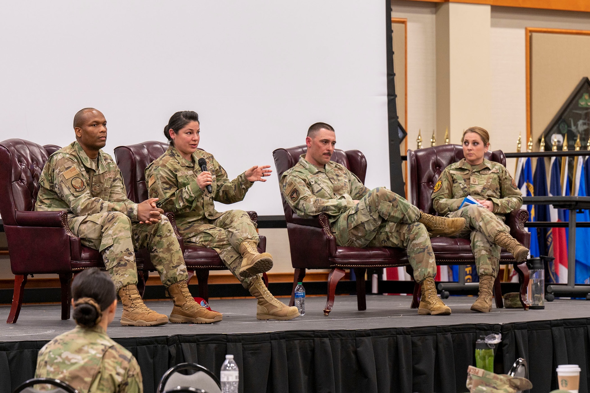 Maj. Katherine Roman, 40th Helicopter Squadron resource advisor, left, and Lt. Col. Julia Roloson, 341st Security Forces Squadron commander, speak at an all-female officers' panel during a women's leadership symposium March 21, 2023, at Malmstrom Air Force Base, Mont. The two-day symposium was open to all on base and covered a wide range of topics to include leadership, mentorship, retention, wellness and readiness. (U.S. Air Force photo by Airman Hannah Hardy)