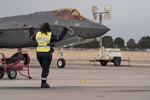 An Israeli Air Force member marshals an F-35I Adir after a Red Flag-Nellis 23-2 mission at Nellis Air Force Base, Nevada, March 15, 2023.