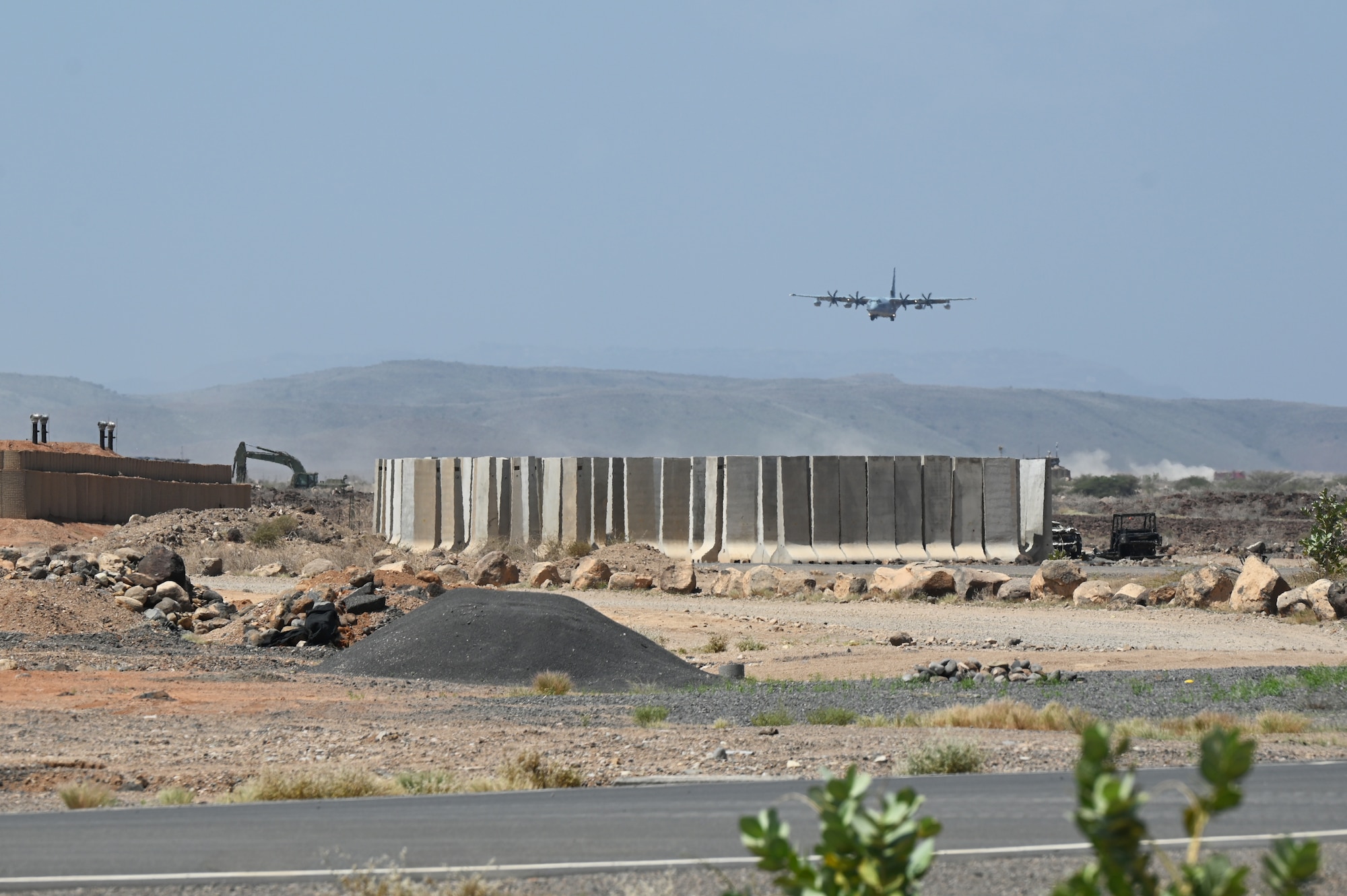 A U.S. Marine Corps KC-130J lands at the refueling site in support of a simulated Forward Arming and Refueling Point (FARP) exercise at Chabelley Airfield, Djibouti, Feb. 22, 2023. The ability of a Joint Force Commander to move their forces fluidly across the theater to seize, retain and utilize initiatives against an adversary is key to ensuring readiness and resilience, and protecting assets and personnel. (U.S. Air Force photo by Tech. Sgt. Jayson Burns)