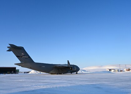 A C-17 Globemaster III from the 105th Airlift Wing sits parked at Resolute Bay, Nunavut, Canada March 18, 2023.