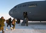 Soldiers from the Canadian Armed Forces board a C-17 Globemaster III from the 105th Airlift Wing during exercise Guerrier Nordique at Resolute Bay, Nunavut, Canada March 18, 2023
