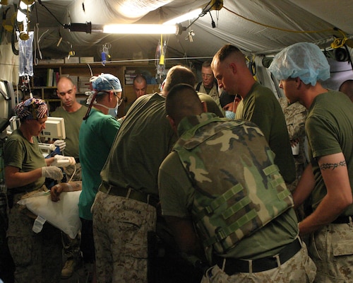 Bruce Gillingham at work during a deployment to Surgical Shock Trauma Platoon in Taqqadum, Iraq-located in the Sunni triangle between the volatile cities of Ramadi and Fallujah.