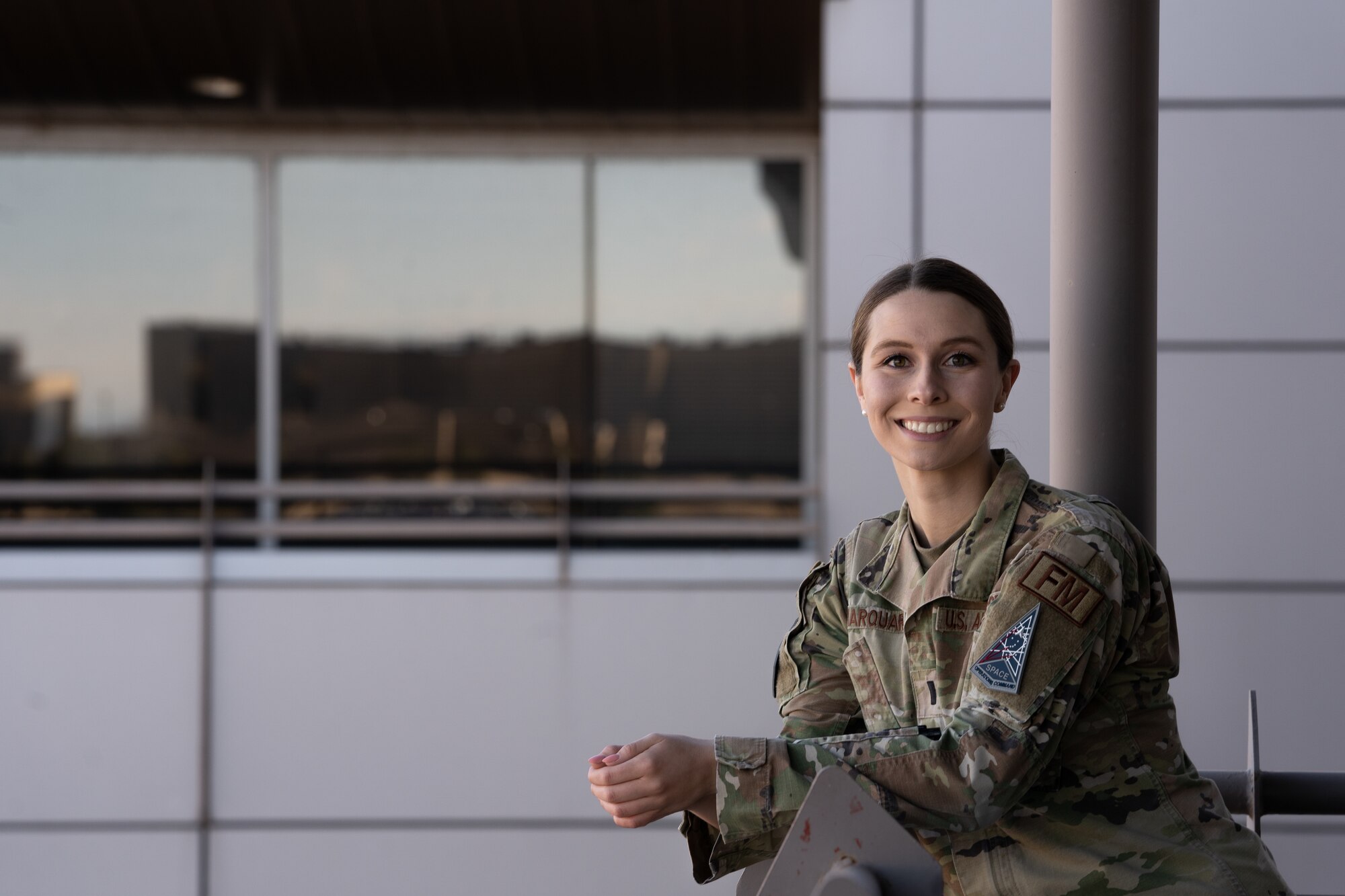 U.S. Air Force 1st Lt. Amanda Marquart, Schriever Space Force Base executive officer to the vice commander, stands on a balcony looking out over the installation at Schriever SFB