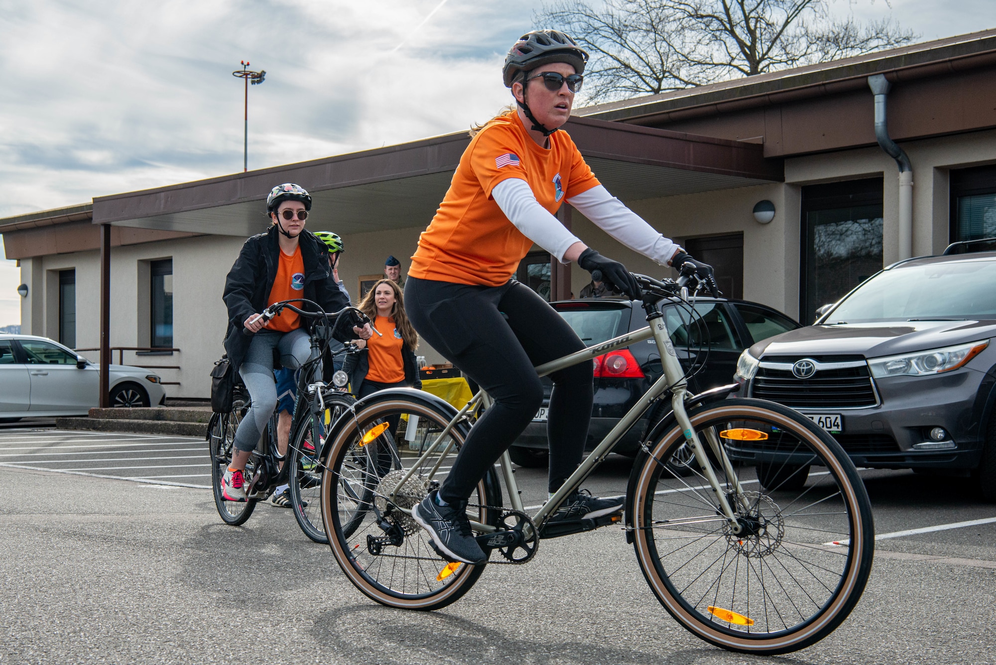 Airmen bike to a memorial