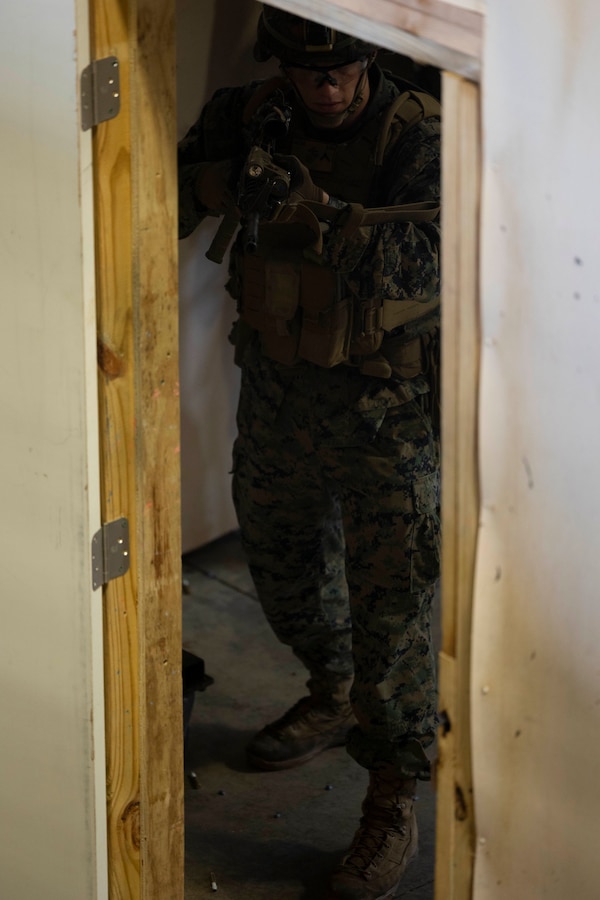 Marines with 1st Battalion, 8th Marines, execute close-quarters battle techniques at Camp Lejeune, North Carolina, Aug. 28 – Sept. 9, 2022. The training, conducted with Marine Forces Special Operations Command, included static and moving drills, single and multi-room clears, and full team house runs. This allows for better integration between Special Operations Forces and the Fleet Marine Force to unite tactical and operational efforts and create interdependence on the battlefield and for the future operating environment. (U.S. Marine Corps photo by Sgt. Jesula Jeanlouis)