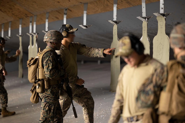 Marine Raiders with 3rd Marine Raider Battalion and Marines with 1st Battalion, 8th Marines, conduct shooting drills at Camp Lejeune, North Carolina, Aug. 28 – Sept. 9, 2022. The training included static and moving drills, single and multi-room clears, and full team house runs. This allows for better integration between Special Operations Forces and the Fleet Marine Force to unite tactical and operational efforts and create interdependence on the battlefield and for the future operating environment. (U.S. Marine Corps photo by Sgt. Jesula Jeanlouis)
