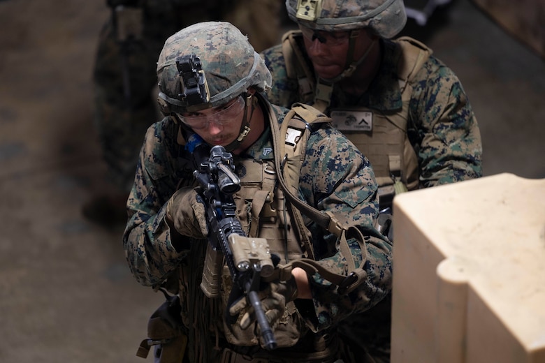 Marines with 1st Battalion, 8th Marines, execute close-quarters battle techniques at Camp Lejeune, North Carolina, Aug. 28 – Sept. 9, 2022. The training, conducted with Marine Forces Special Operations Command, included static and moving drills, single and multi-room clears, and full team house runs. This allows for better integration between Special Operations Forces and the Fleet Marine Force to unite tactical and operational efforts and create interdependence on the battlefield and for the future operating environment. (U.S. Marine Corps photo by Sgt. Jesula Jeanlouis)